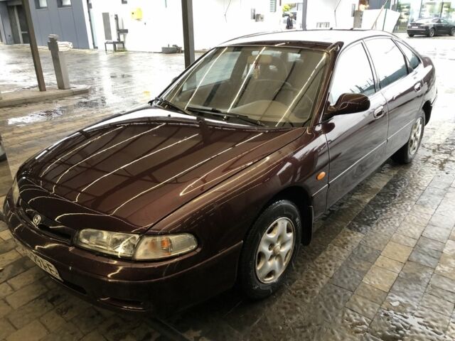 Красный Мазда 626, объемом двигателя 2 л и пробегом 190 тыс. км за 850 $, фото 1 на Automoto.ua