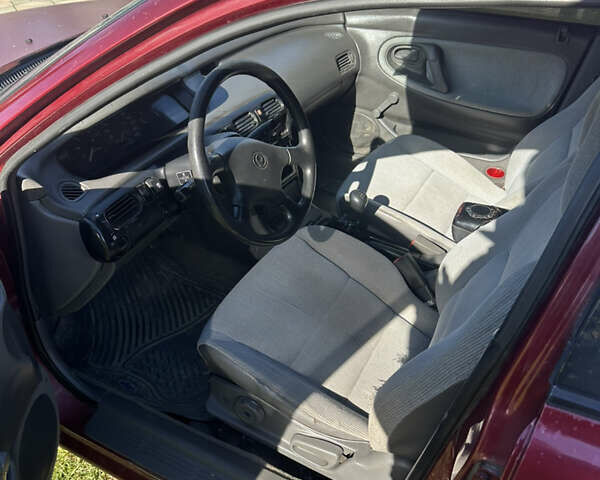 Мазда 626 1996 в Черновцах на Automoto.ua Красный Мазда 626, объемом двигателя 2 л и пробегом 404 тыс. км за 2078 $, фото 5 на Automoto.ua