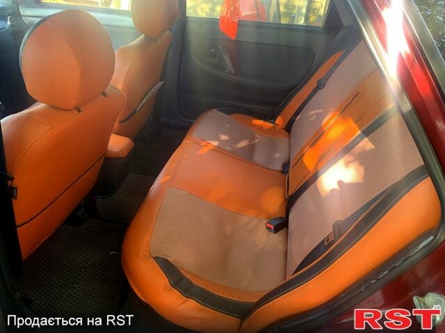 Красный Мазда 626, объемом двигателя 1.8 л и пробегом 300 тыс. км за 1600 $, фото 1 на Automoto.ua