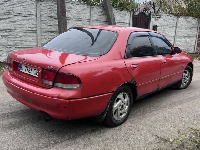 Красный Мазда 626, объемом двигателя 1.8 л и пробегом 248 тыс. км за 1000 $, фото 7 на Automoto.ua