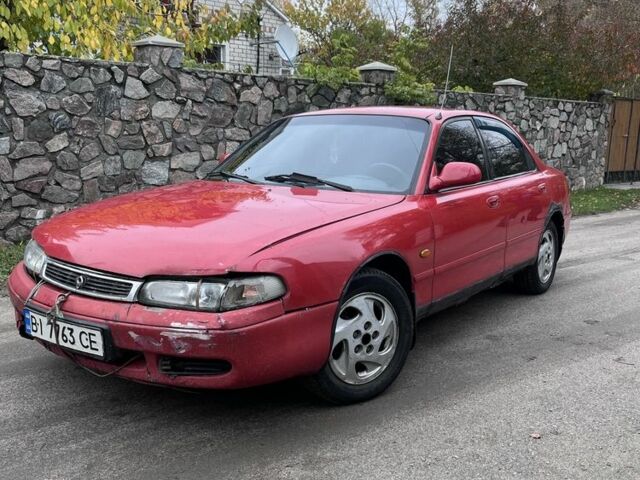 Красный Мазда 626, объемом двигателя 1.8 л и пробегом 248 тыс. км за 1000 $, фото 1 на Automoto.ua