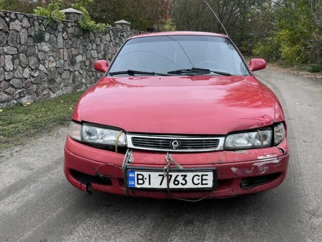 Красный Мазда 626, объемом двигателя 1.8 л и пробегом 248 тыс. км за 1000 $, фото 2 на Automoto.ua