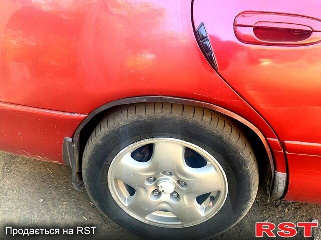 Красный Мазда 626, объемом двигателя 1.8 л и пробегом 300 тыс. км за 1600 $, фото 4 на Automoto.ua