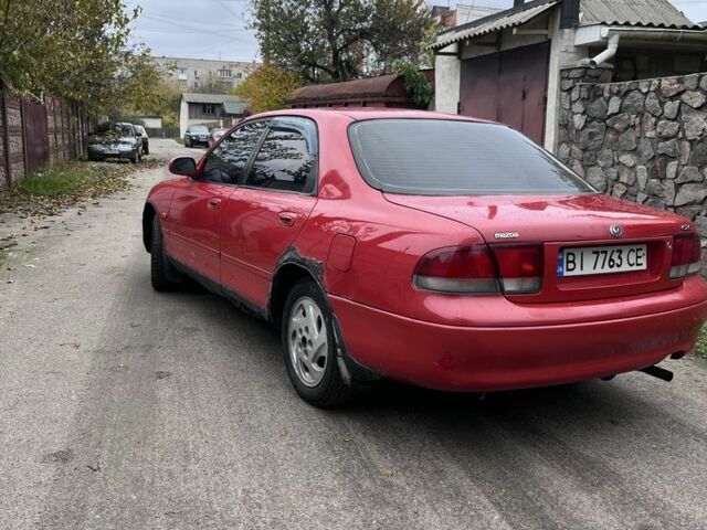 Красный Мазда 626, объемом двигателя 1.8 л и пробегом 248 тыс. км за 1000 $, фото 3 на Automoto.ua