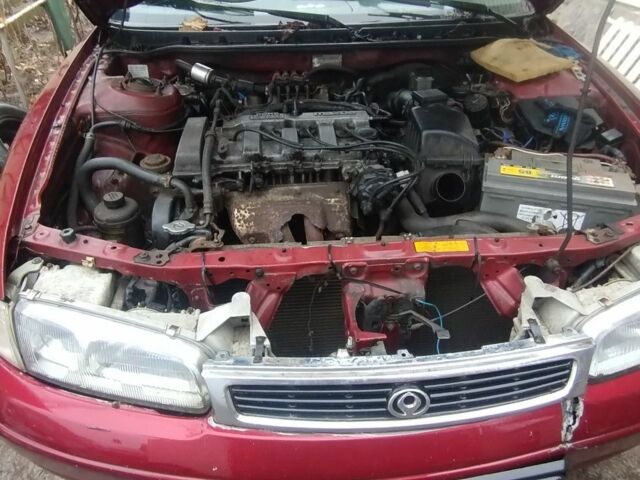 Красный Мазда 626, объемом двигателя 1.8 л и пробегом 400 тыс. км за 650 $, фото 3 на Automoto.ua