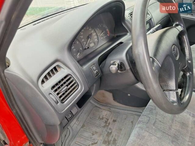 Красный Мазда 626, объемом двигателя 2 л и пробегом 111 тыс. км за 1800 $, фото 32 на Automoto.ua