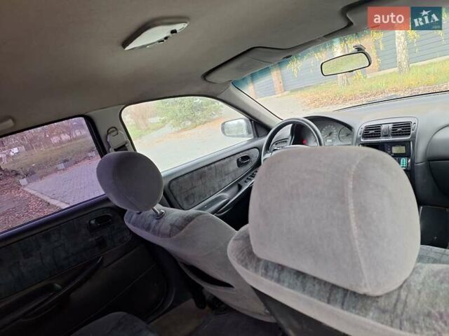 Красный Мазда 626, объемом двигателя 2 л и пробегом 111 тыс. км за 1800 $, фото 22 на Automoto.ua