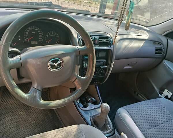Красный Мазда 626, объемом двигателя 1.84 л и пробегом 34 тыс. км за 2500 $, фото 7 на Automoto.ua