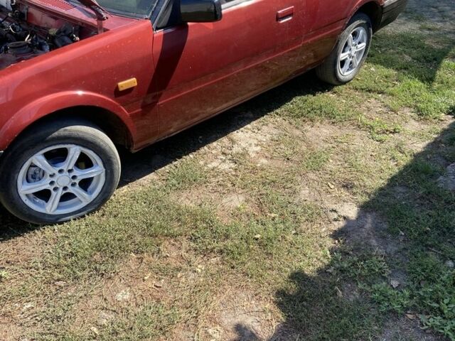 Червоний Мазда 626, об'ємом двигуна 2 л та пробігом 310 тис. км за 1150 $, фото 1 на Automoto.ua