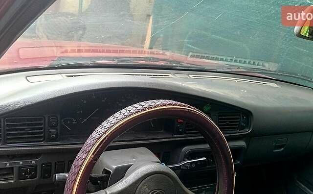 Красный Мазда 626, объемом двигателя 2 л и пробегом 23 тыс. км за 700 $, фото 1 на Automoto.ua