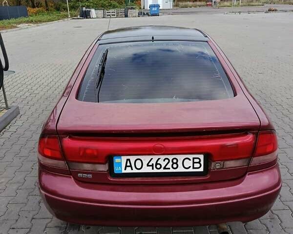Красный Мазда 626, объемом двигателя 1.8 л и пробегом 365 тыс. км за 1800 $, фото 4 на Automoto.ua