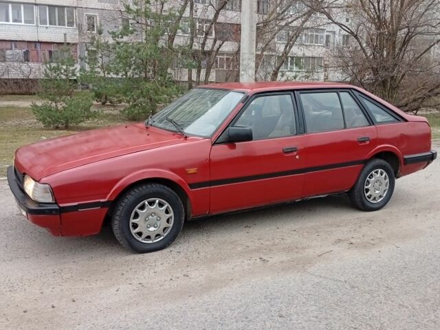 Червоний Мазда 626, об'ємом двигуна 2 л та пробігом 333 тис. км за 950 $, фото 9 на Automoto.ua