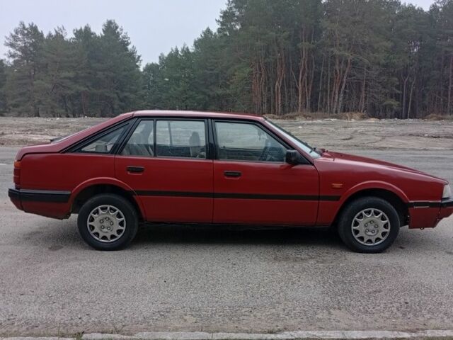 Червоний Мазда 626, об'ємом двигуна 2 л та пробігом 333 тис. км за 950 $, фото 1 на Automoto.ua