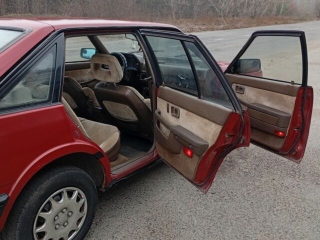 Червоний Мазда 626, об'ємом двигуна 2 л та пробігом 333 тис. км за 950 $, фото 5 на Automoto.ua