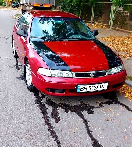 Красный Мазда 626, объемом двигателя 2 л и пробегом 320 тыс. км за 1500 $, фото 4 на Automoto.ua