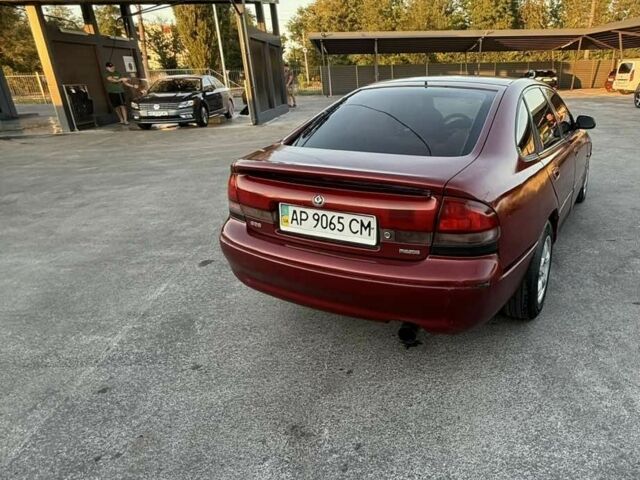 Красный Мазда 626, объемом двигателя 1.8 л и пробегом 270 тыс. км за 1350 $, фото 6 на Automoto.ua