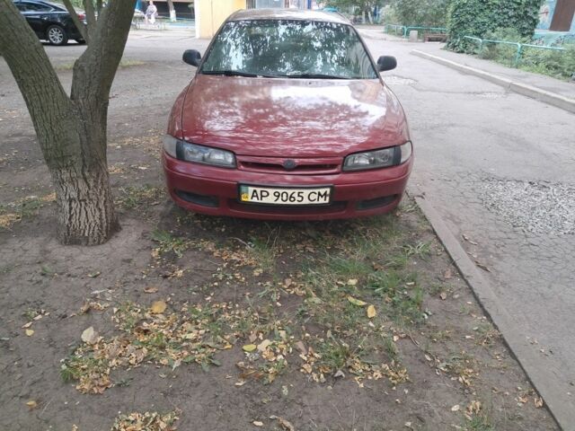 Красный Мазда 626, объемом двигателя 1.8 л и пробегом 270 тыс. км за 1350 $, фото 1 на Automoto.ua