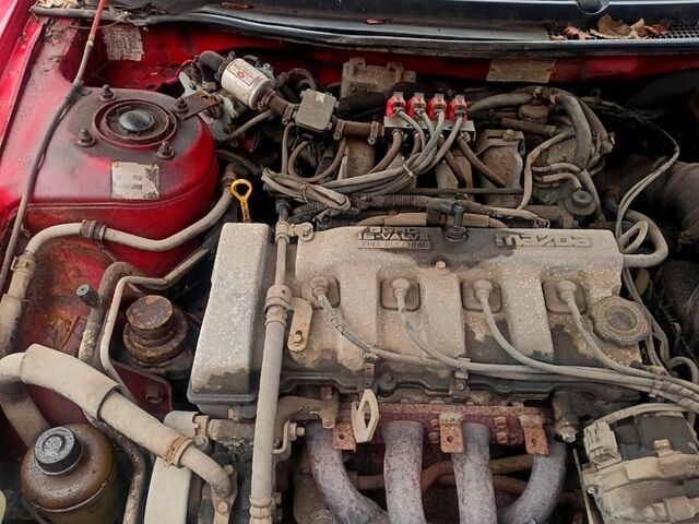 Красный Мазда 626, объемом двигателя 2 л и пробегом 247 тыс. км за 940 $, фото 1 на Automoto.ua