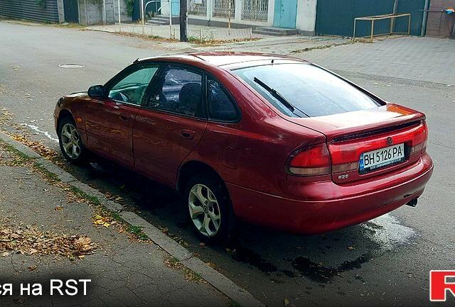 Красный Мазда 626, объемом двигателя 2 л и пробегом 320 тыс. км за 1500 $, фото 3 на Automoto.ua