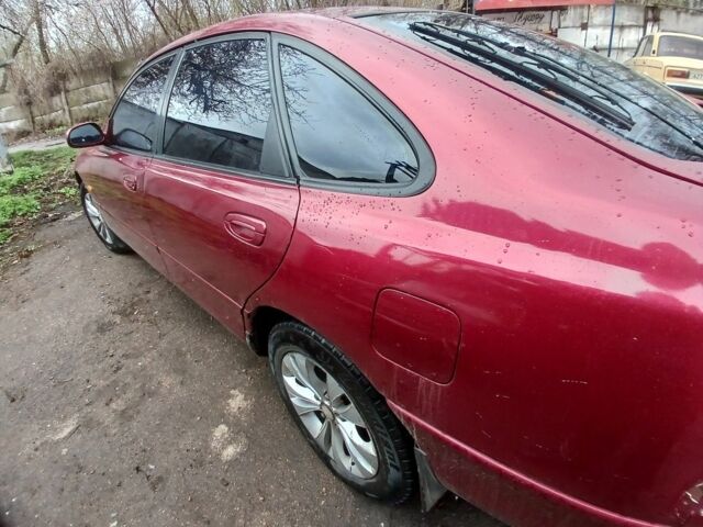 Красный Мазда 626, объемом двигателя 2 л и пробегом 1 тыс. км за 1899 $, фото 4 на Automoto.ua