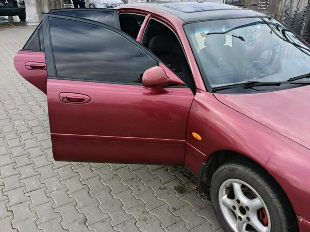 Червоний Мазда 626, об'ємом двигуна 1.8 л та пробігом 365 тис. км за 1800 $, фото 1 на Automoto.ua