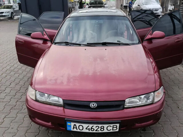 Червоний Мазда 626, об'ємом двигуна 1.8 л та пробігом 365 тис. км за 1800 $, фото 2 на Automoto.ua