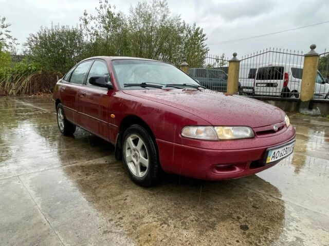 Красный Мазда 626, объемом двигателя 1.8 л и пробегом 200 тыс. км за 1200 $, фото 2 на Automoto.ua