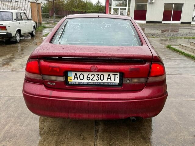 Красный Мазда 626, объемом двигателя 1.8 л и пробегом 200 тыс. км за 1200 $, фото 3 на Automoto.ua