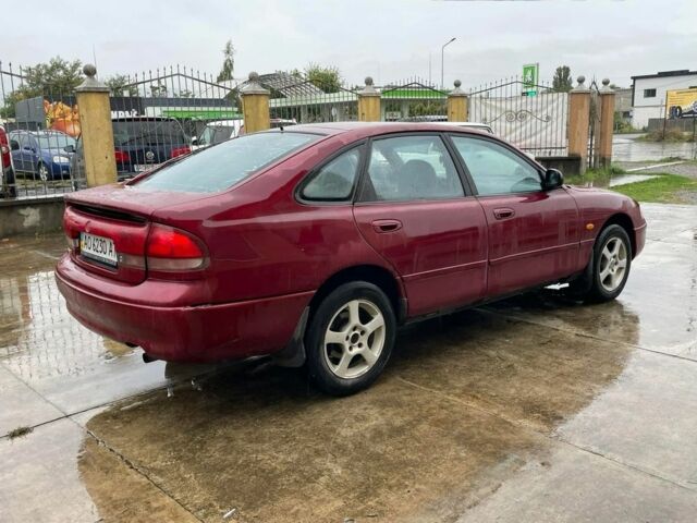 Красный Мазда 626, объемом двигателя 1.8 л и пробегом 200 тыс. км за 1200 $, фото 4 на Automoto.ua