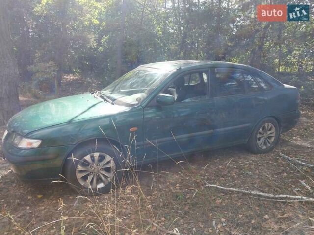 Мазда 626, объемом двигателя 2 л и пробегом 300 тыс. км за 1200 $, фото 4 на Automoto.ua