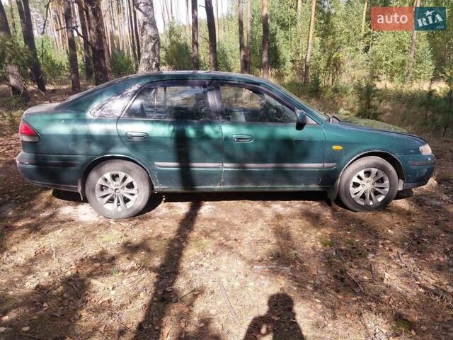 Мазда 626, объемом двигателя 2 л и пробегом 300 тыс. км за 1200 $, фото 7 на Automoto.ua