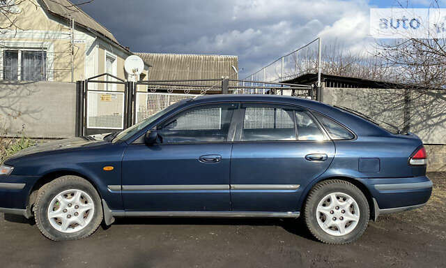 Мазда 626, объемом двигателя 2 л и пробегом 365 тыс. км за 3500 $, фото 7 на Automoto.ua