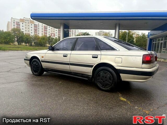 Мазда 626, объемом двигателя 2 л и пробегом 300 тыс. км за 1000 $, фото 2 на Automoto.ua