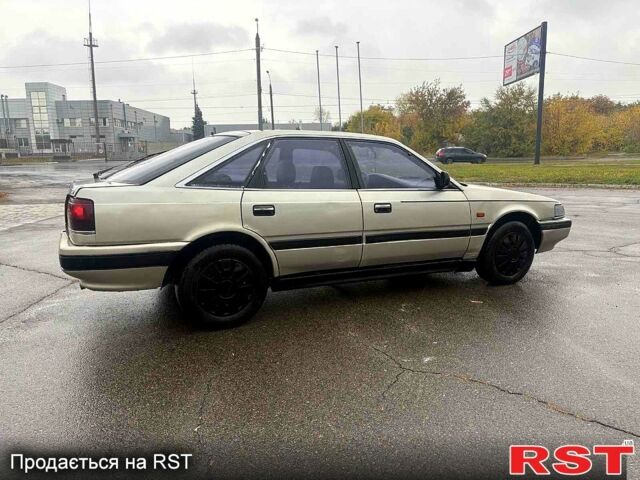 Мазда 626, объемом двигателя 2 л и пробегом 300 тыс. км за 1000 $, фото 3 на Automoto.ua