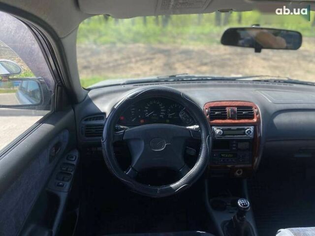 Мазда 626, объемом двигателя 2 л и пробегом 280 тыс. км за 3290 $, фото 22 на Automoto.ua