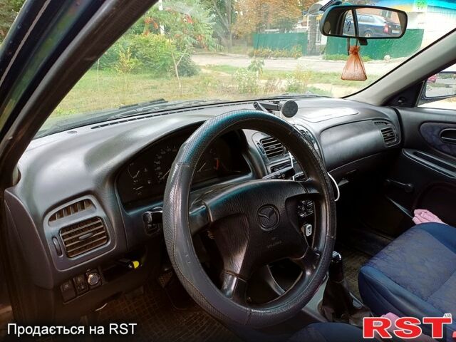 Мазда 626, объемом двигателя 2 л и пробегом 500 тыс. км за 1000 $, фото 3 на Automoto.ua