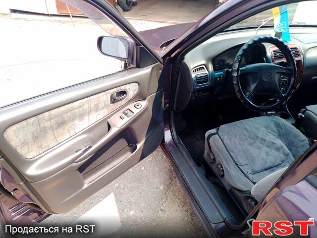 Мазда 626, об'ємом двигуна 1.9 л та пробігом 327 тис. км за 2400 $, фото 5 на Automoto.ua