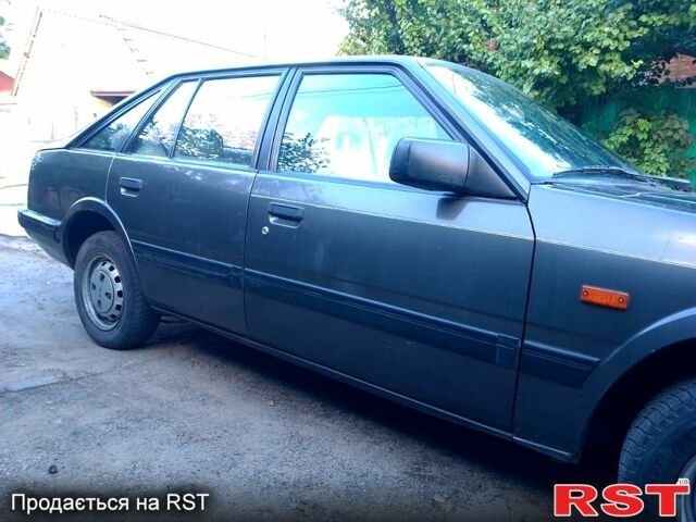 Мазда 626, об'ємом двигуна 2 л та пробігом 263 тис. км за 1600 $, фото 5 на Automoto.ua