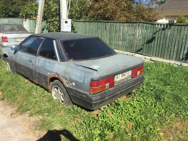 Серый Мазда 626, объемом двигателя 2 л и пробегом 999 тыс. км за 350 $, фото 1 на Automoto.ua