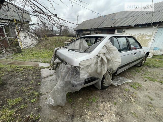 Серый Мазда 626, объемом двигателя 2 л и пробегом 450 тыс. км за 600 $, фото 6 на Automoto.ua