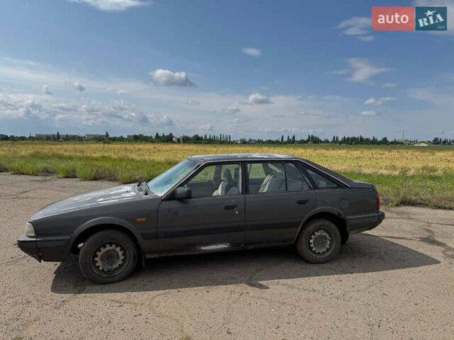 Сірий Мазда 626, об'ємом двигуна 2 л та пробігом 650 тис. км за 479 $, фото 1 на Automoto.ua