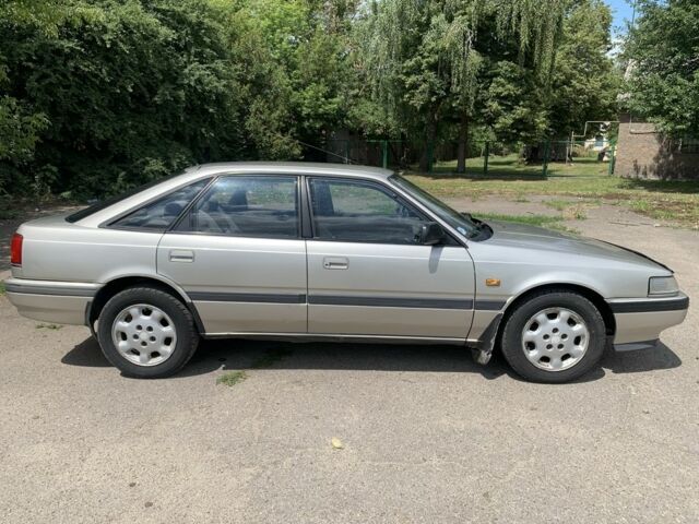 Серый Мазда 626, объемом двигателя 1.6 л и пробегом 178 тыс. км за 1500 $, фото 1 на Automoto.ua