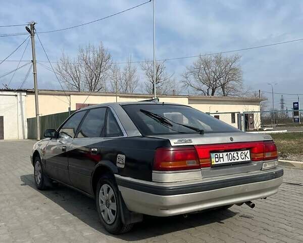 Серый Мазда 626, объемом двигателя 2 л и пробегом 245 тыс. км за 1400 $, фото 4 на Automoto.ua