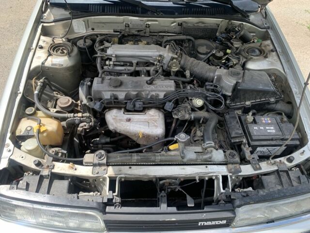 Серый Мазда 626, объемом двигателя 1.6 л и пробегом 178 тыс. км за 1500 $, фото 8 на Automoto.ua