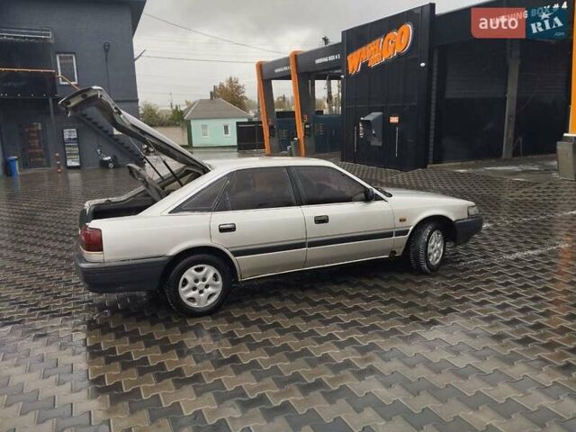 Серый Мазда 626, объемом двигателя 2 л и пробегом 343 тыс. км за 1273 $, фото 2 на Automoto.ua