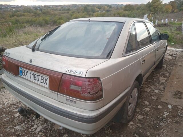 Серый Мазда 626, объемом двигателя 2 л и пробегом 320 тыс. км за 1079 $, фото 4 на Automoto.ua