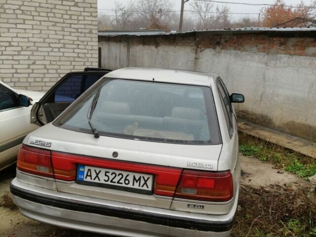 Серый Мазда 626, объемом двигателя 2 л и пробегом 300 тыс. км за 1200 $, фото 2 на Automoto.ua