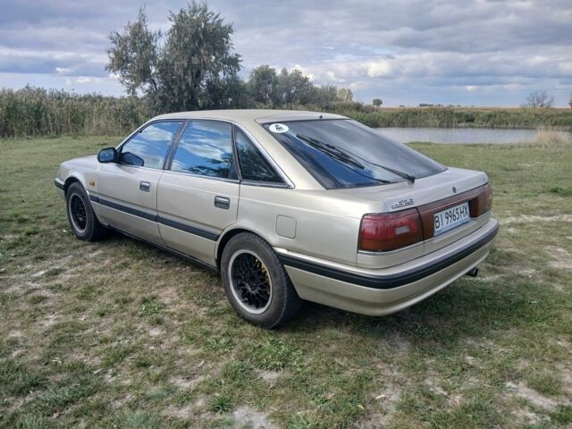 Серый Мазда 626, объемом двигателя 2 л и пробегом 320 тыс. км за 2022 $, фото 7 на Automoto.ua