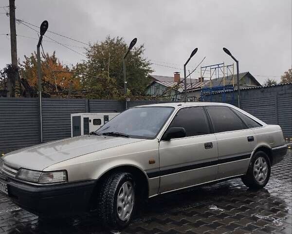 Серый Мазда 626, объемом двигателя 2 л и пробегом 343 тыс. км за 1273 $, фото 1 на Automoto.ua