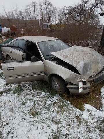 Серый Мазда 626, объемом двигателя 2 л и пробегом 400 тыс. км за 500 $, фото 3 на Automoto.ua